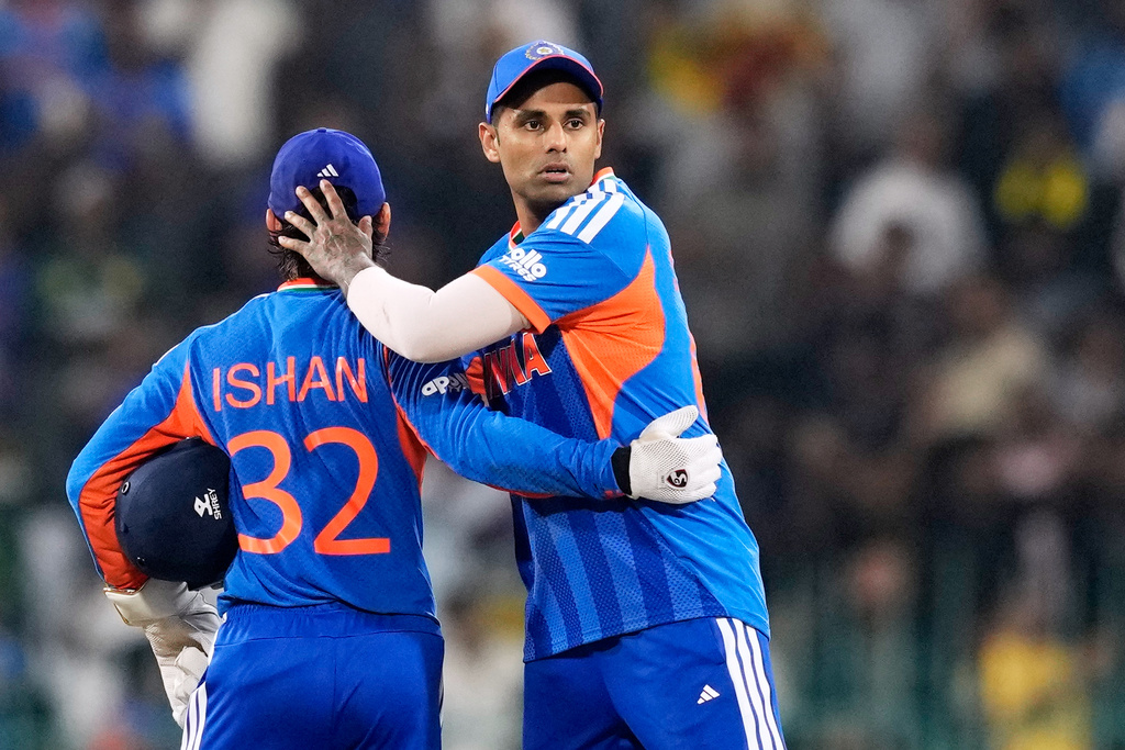 India's captain Suryakumar Yadav, right, and Ishan Kishan celebrate after India won their T20 World Cup cricket match against Pakistan in Colombo, Sri Lanka, Sunday, Feb. 15, 2026. (AP Photo/Eranga Jayawardena)