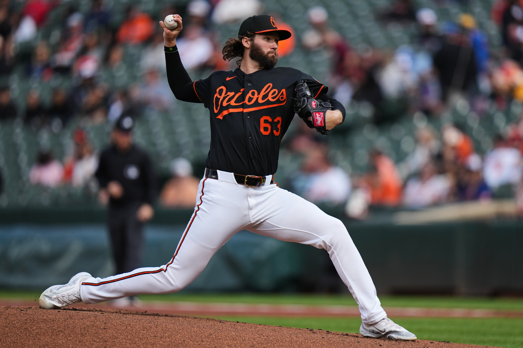 Baltimore Orioles starting pitcher Brandon Young (63) delivers during the first inning in the second baseball game of a doubleheader against the Houston Astros, Thursday, April 30, 2026, in Baltimore. (AP Photo/Stephanie Scarbrough)
