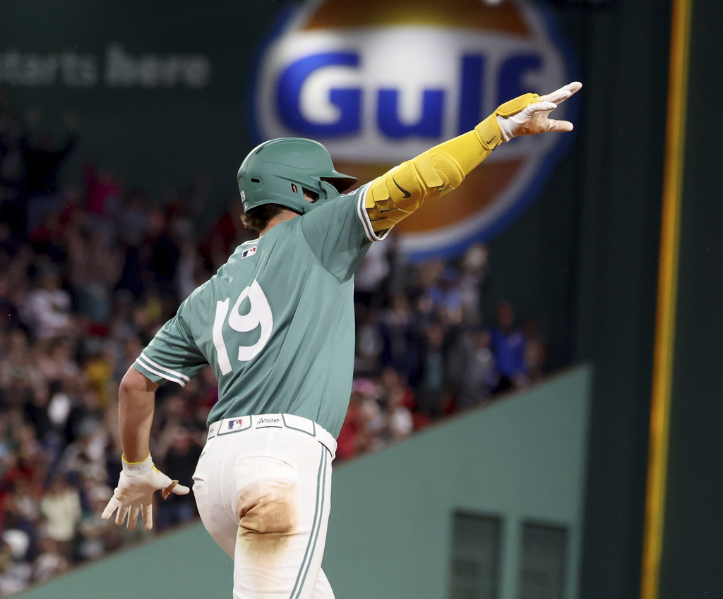 Boston Red Sox's Roman Anthony gestures as he rounds the bases after hitting a home run during the fifth inning of a baseball game against the Pittsburgh Pirates, Friday, Aug. 29, 2025, in Boston. (AP Photo/Mark Stockwell)
