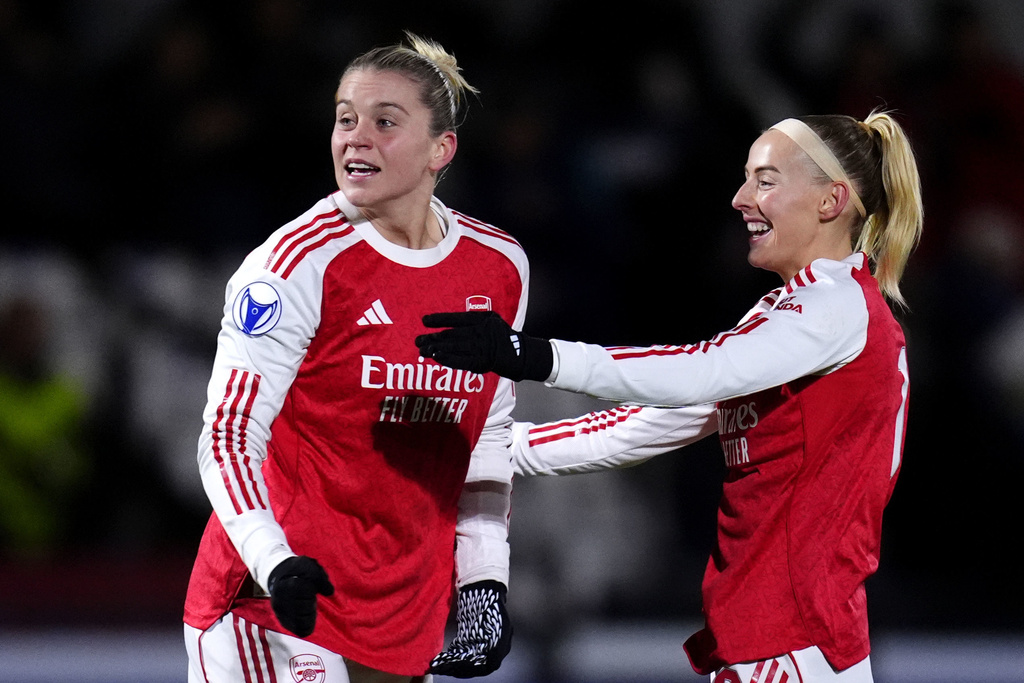 Arsenal's Alessia Russo, left, celebrates scoring with Chloe Kelly during the Women's Champions League soccer match between Arsenal and Real Madrid in Borehamwood, England, Wednesday, Nov. 19, 2025. (John Walton/PA via AP)