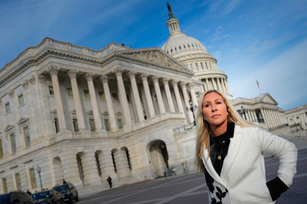 Rep. Marjorie Taylor Greene, R-Ga., arrives to a news conference on the Epstein Files Transparency Act, Tuesday, Nov. 18, 2025, outside the U.S. Capitol in Washington. (AP Photo/Julia Demaree Nikhinson)