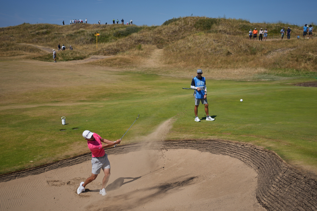 Collin Morikawa of the United States plays out of a bunker on the 11th green during a practice round for the British Open Golf championships at Royal Birkdale golf club, in Southport, England, Tuesday, July 14, 2026. (AP Photo/Jon Super)