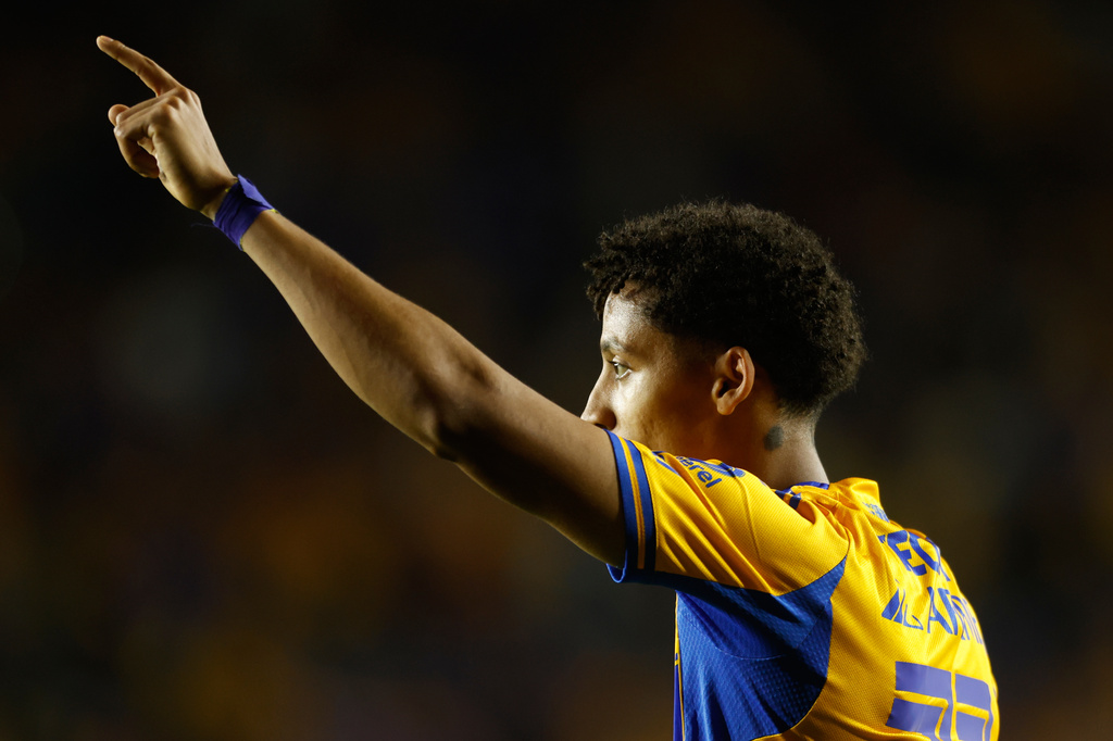 Ozziel Herrera of Mexico's Tigres celebrates scoring his side's opening goal against the United States' Seattle Sounders during a CONCACAF Champions Cup quarterfinal first leg soccer match in Monterrey, Mexico, Wednesday, April 8, 2026. (AP Photo/Jorge Mendoza)