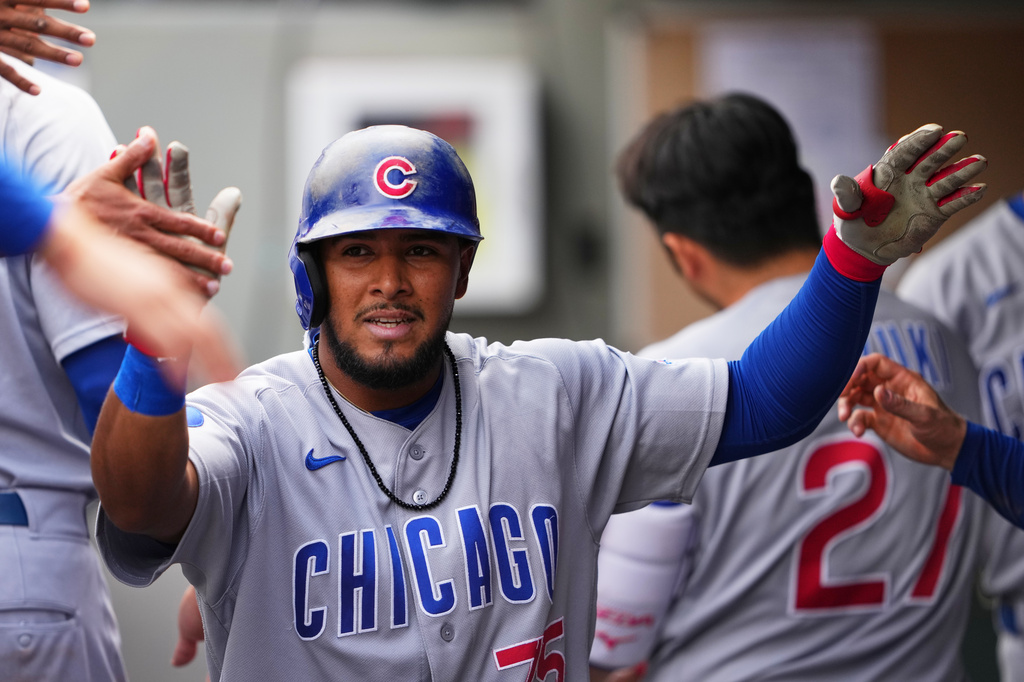 Chicago Cubs' Pedro Ramírez celebrates scoring on an RBI single from Carson Kelly against the Seattle Mariners during the eighth inning of a baseball game, Sunday, Aug. 23, 2026, in Seattle. (AP Photo/Lindsey Wasson)