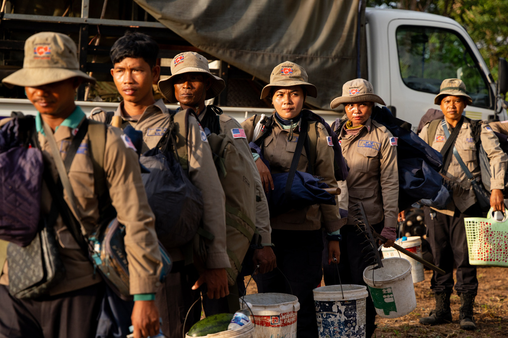 Deminers prepare to enter a landmine field in Siem Reap, Cambodia on Thursday, July 2, 2026. (AP Photo/Anton L. Delgado)