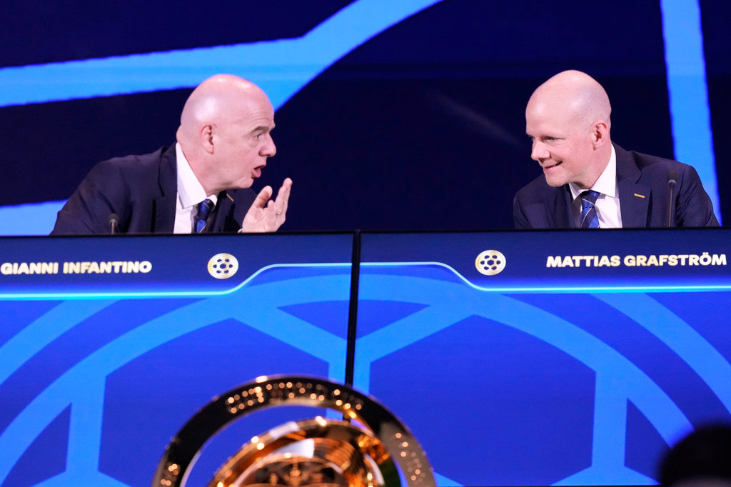FILE - FIFA President Gianni Infantino, left, speaks to General Secretary Mattias Grafström during FIFA's 75th Congress at the Conmebol Convention Center in Luque, Paraguay, Thursday, May 15, 2025. (AP Photo/Fernando Calistro, File)