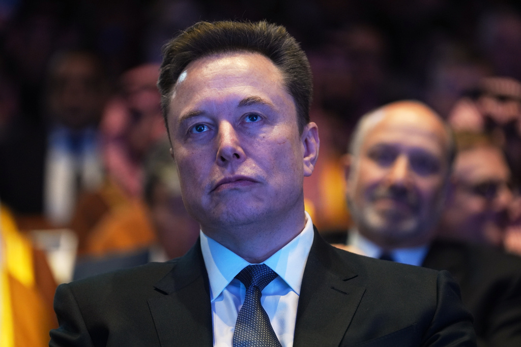 FILE - Elon Musk attends the Saudi Investment Forum at the Kennedy Center, Wednesday, Nov. 19, 2025, in Washington. (AP Photo/Evan Vucci, File)