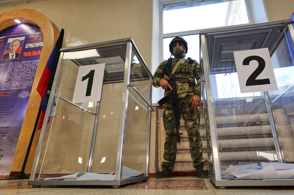 Ballot boxes are seen at a polling station during the parliamentary election in Donetsk, in the Russian-controlled part of the Donetsk region, Ukraine Friday, Sept. 18, 2026. (AP Photo)