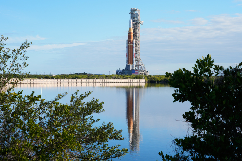 NASA's new moon rocket, Artemis II, makes its way from the Vehicle Assembly Building to pad 39B at the Kennedy Space Center, Saturday, Jan. 17, 2026, in Cape Canaveral, Fla. (AP Photo/John Raoux)