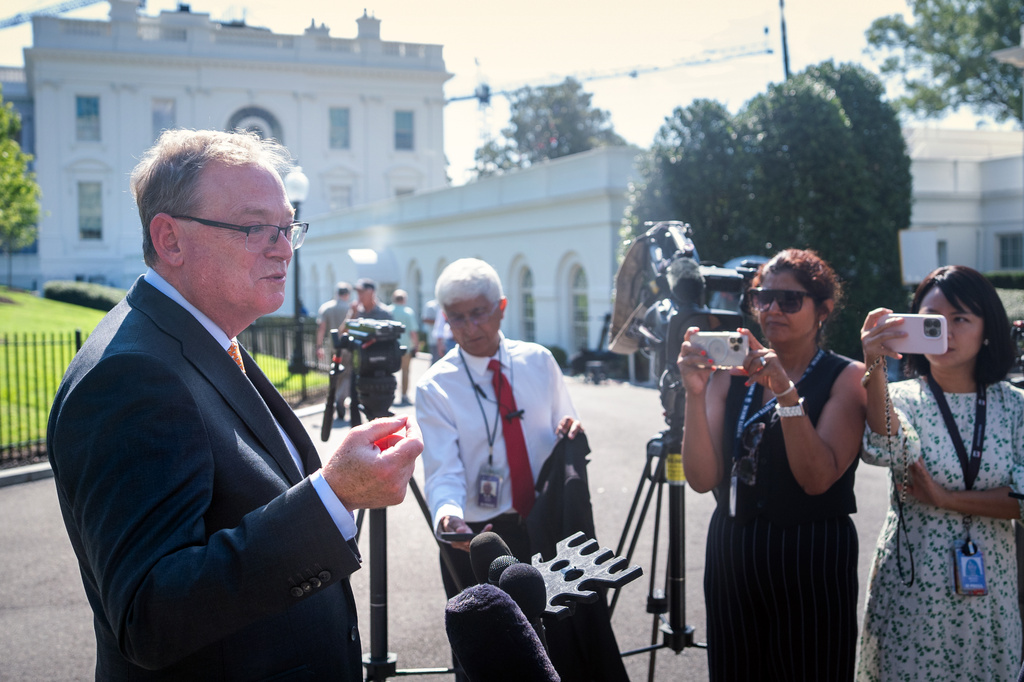 Kevin Hassett, director of the White House National Economic Council, speaks to reporters outside the White House, Friday, Aug. 7, 2026, in Washington. (AP Photo/Mark Schiefelbein)