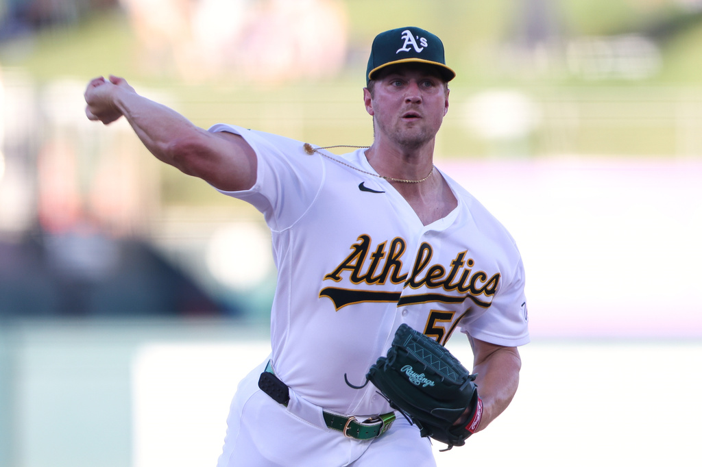 Athletics pitcher Jack Perkins throws to a Boston Red Sox batter during the first inning of a baseball game Monday, July 27, 2026, in West Sacramento, Calif. (AP Photo/Scott Marshall)
