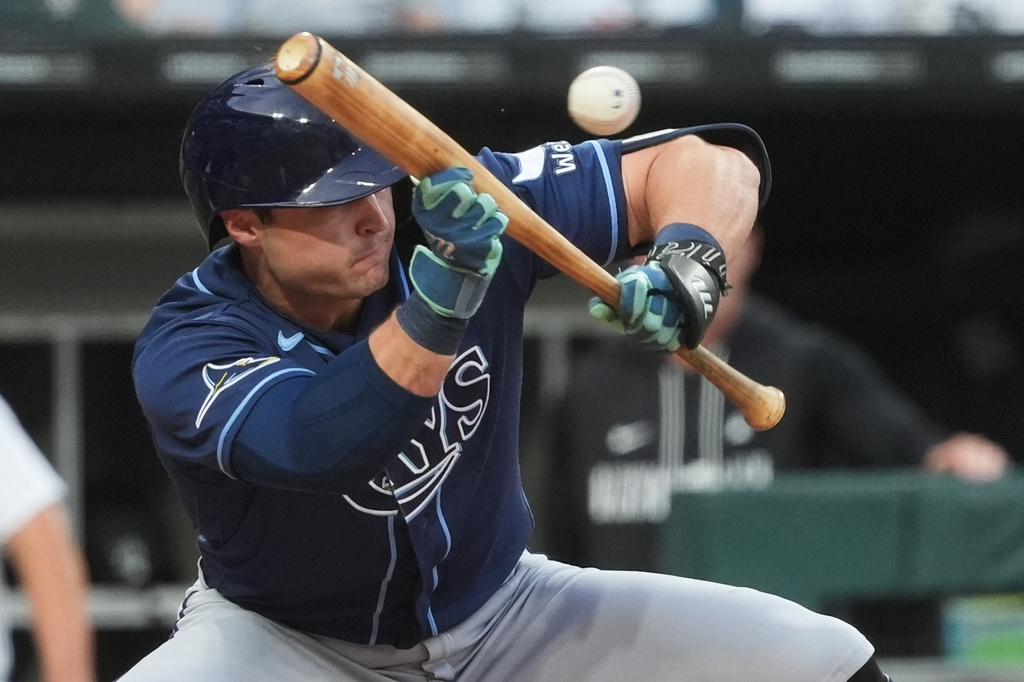 Tampa Bay Rays' Ben Williamson hits a sacrifice bunt during the first inning of a baseball game against the Chicago White Sox in Chicago, Tuesday, April 14, 2026. (AP Photo/Nam Y. Huh)