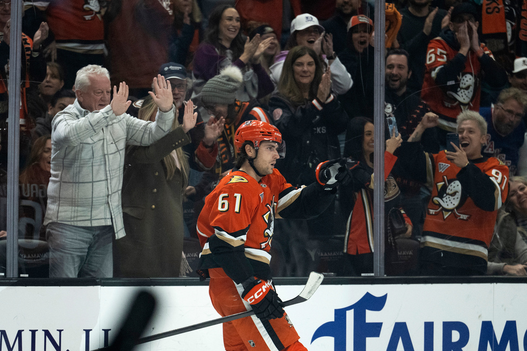 Anaheim Ducks left wing Cutter Gauthier (61) gestures after scoring a goal during the first period of an NHL hockey game against the Florida Panthers, Tuesday, Nov. 4, 2025, in Anaheim, Calif. (AP Photo/Kyusung Gong)