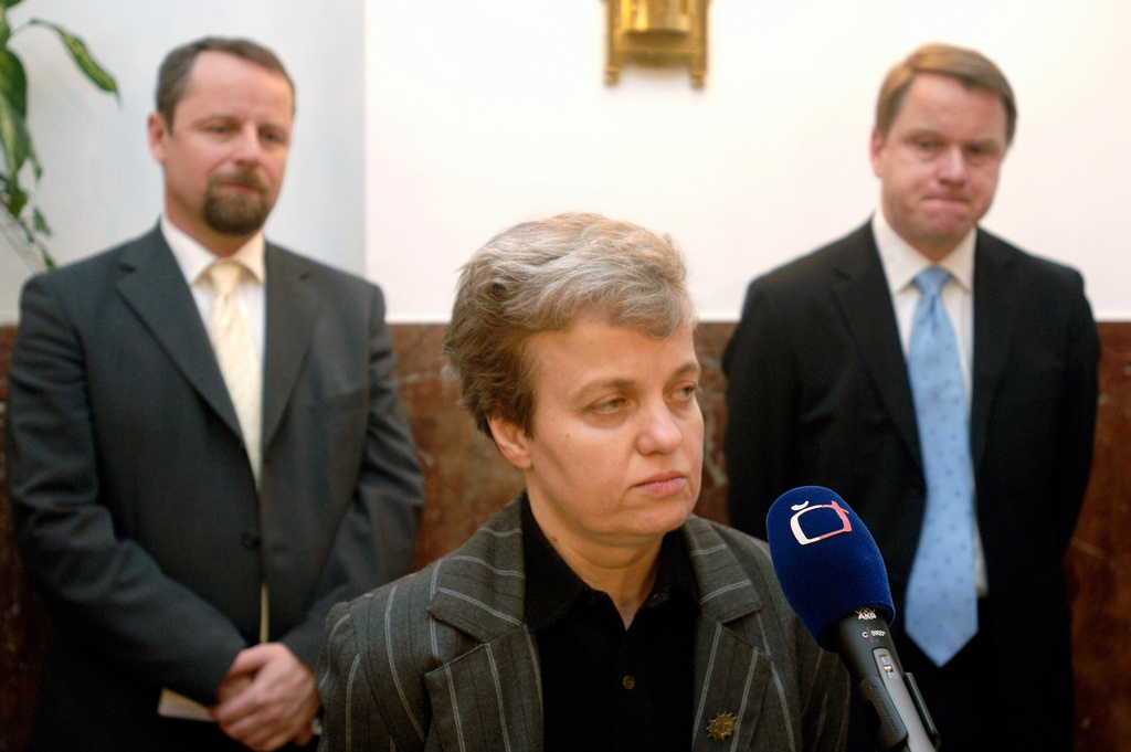 FILE - State Office for Nuclear Safety (SUJB) chairwoman Dana Drabova, center, speaks to journalists during the press conference on problems at nuclear power plant Temelin, in Prague, March 15, 2007. (AStanislav Zbynek/CTK via AP)