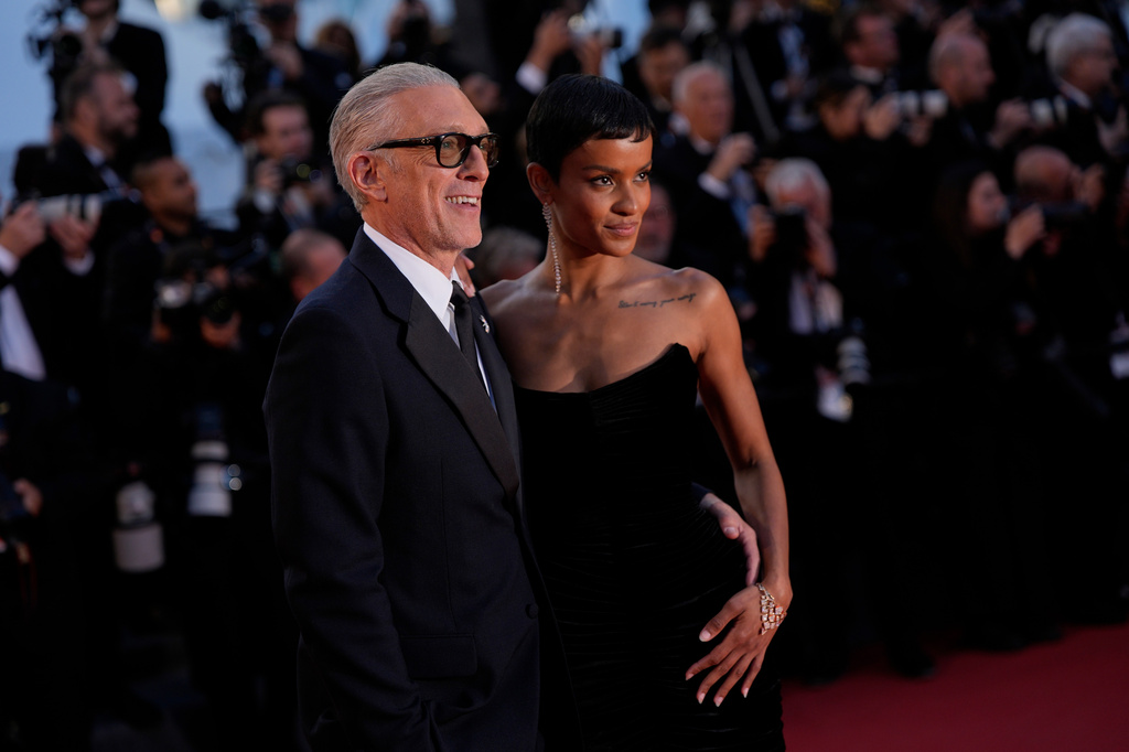 Vincent Cassel, left, and Narah Baptista pose for photographers upon arrival at the premiere of the film 'Parallel Tales' at the 79th international film festival, Cannes, southern France, Thursday, May 14, 2026. (AP Photo/John Locher)