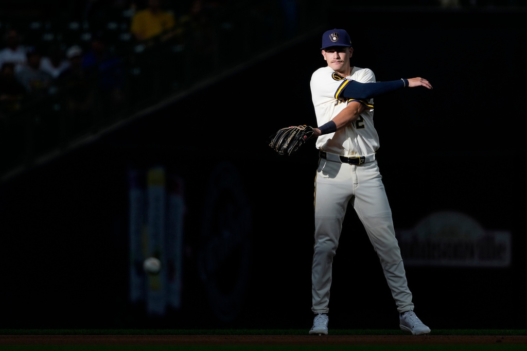 Milwaukee Brewers' Cooper Pratt warms up before the first inning of a baseball game against the Cleveland Guardians, Tuesday, June 16, 2026, in Milwaukee. (AP Photo/Aaron Gash)