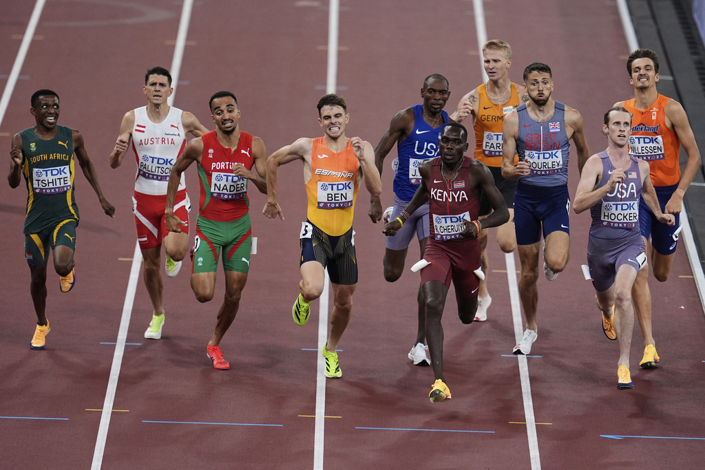 Kenya's Reynold Cheruiyot competes with United States' Cole Hocker, Spain's Adrian Ben and other athletes in a men's 1,500 meters semifinal at the World Athletics Championships in Tokyo, Monday, Sept. 15, 2025. (AP Photo/Abbie Parr)