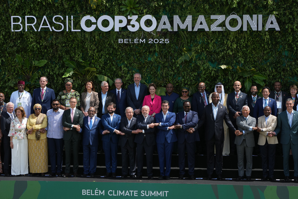 Leaders attending the COP30 U.N. Climate Summit pose for a group photo in Belem, Brazil, Friday, Nov. 7, 2025. (AP Photo/Fernando Llano)