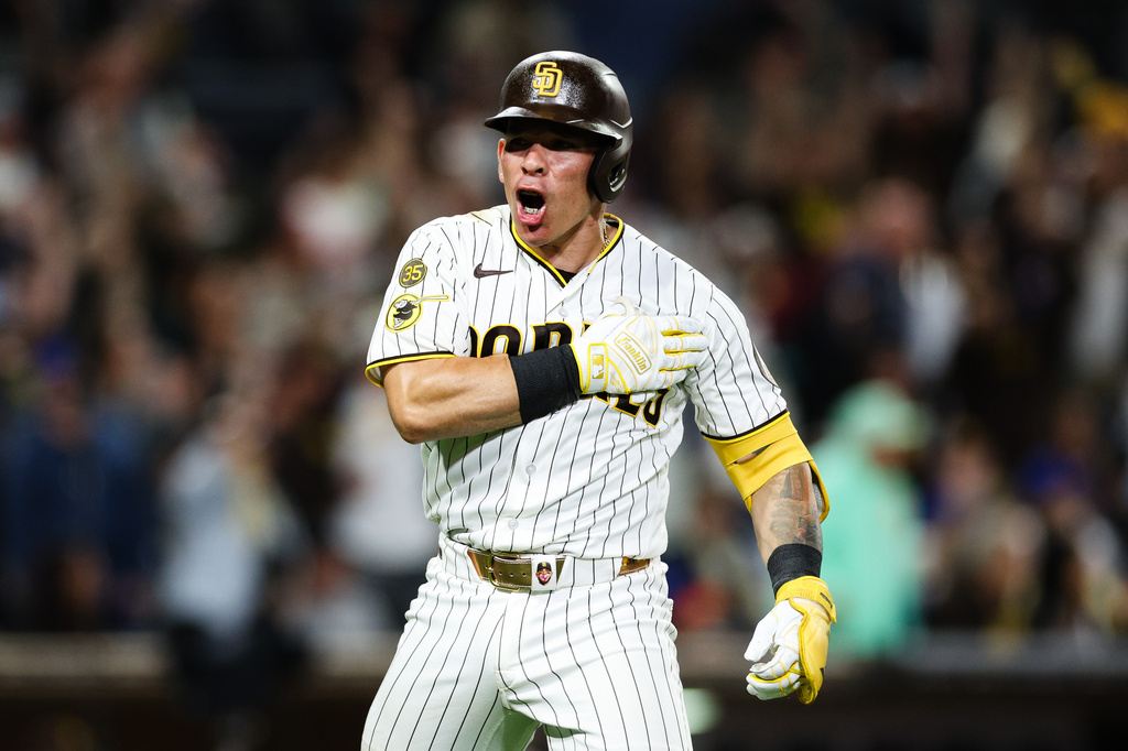 San Diego Padres' Freddy Fermin reacts after hitting a two-run home run against the New York Mets in the seventh inning of a baseball game Saturday, June 6, 2026, in San Diego. (AP Photo/Derrick Tuskan)