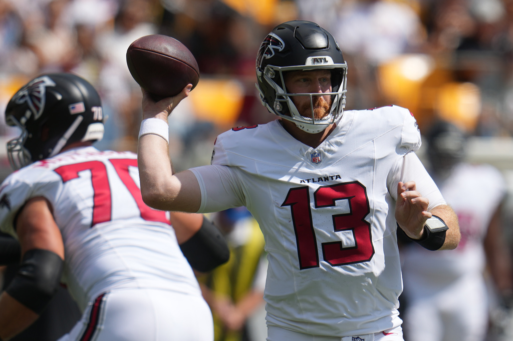 Atlanta Falcons quarterback Cooper Rush (13) looks to pass the ball during an NFL football game against the against the Pittsburgh Steelers, Sunday, Sept. 13, 2026, in Pittsburgh. (AP Photo/Gene J. Puskar)