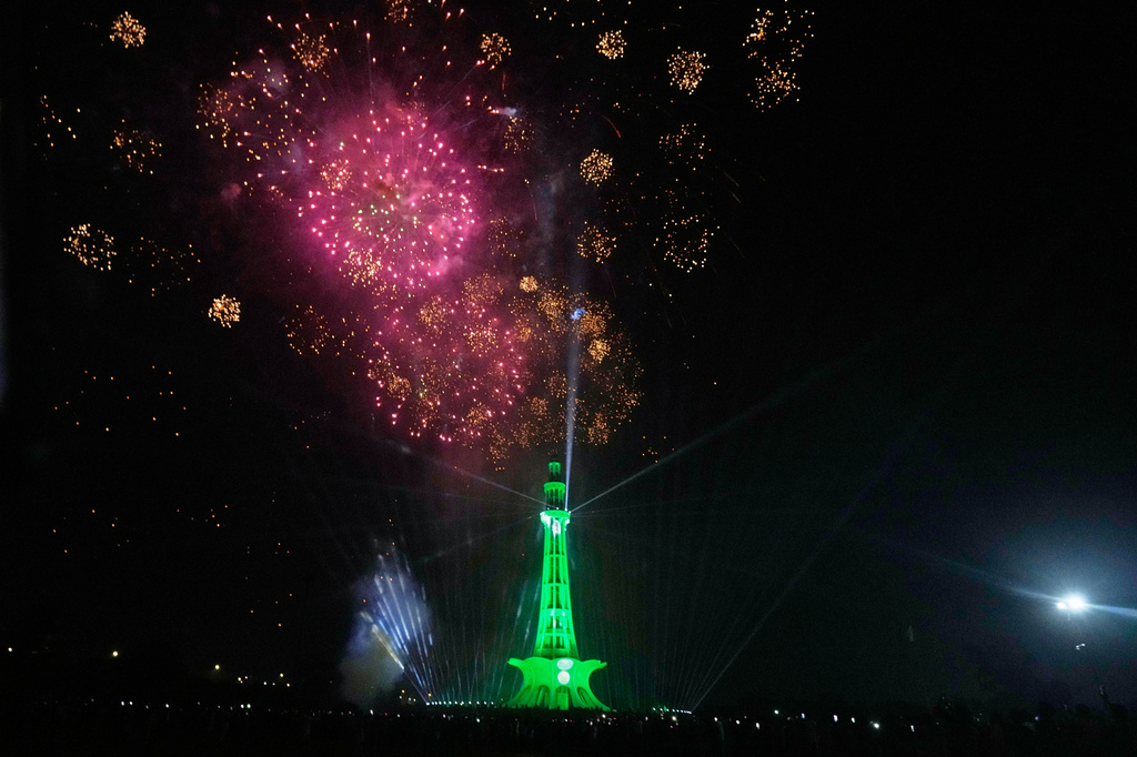Fireworks light the sky over the Minar-e-Pakistan monument marking Independence Day in Lahore, Pakistan, Friday, Aug. 14, 2026. (AP Photo/K.M. Chaudary)