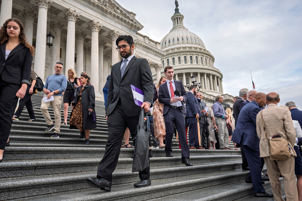 People depart after a ceremony at the Capitol as America observes the 25th anniversary of the 9/11 attacks, in Washington, Friday, Sept. 11, 2026. (AP Photo/J. Scott Applewhite)