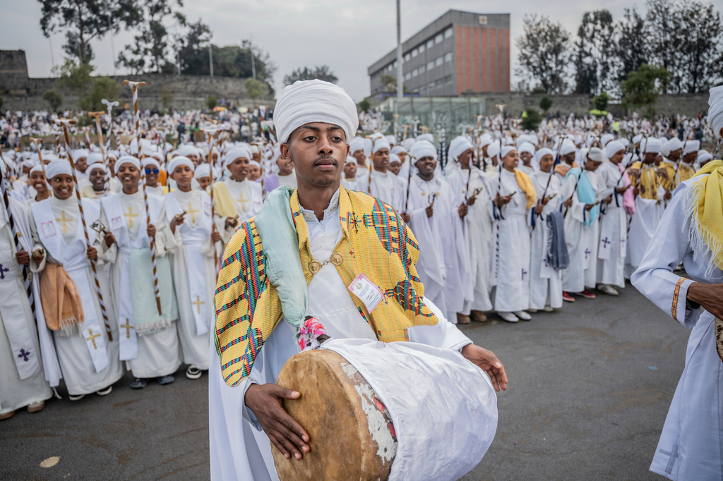 Members of an Orthodox choir perform during celebrations for the Orthodox holiday of Meskel, an annual holiday celebrating the discovery of the True Cross in the fourth century by the Roman Empress Helena, in Addis Ababa, Ethiopia, Saturday, Sept. 26, 2026. (AP Photo/Amanuel Sileshi)