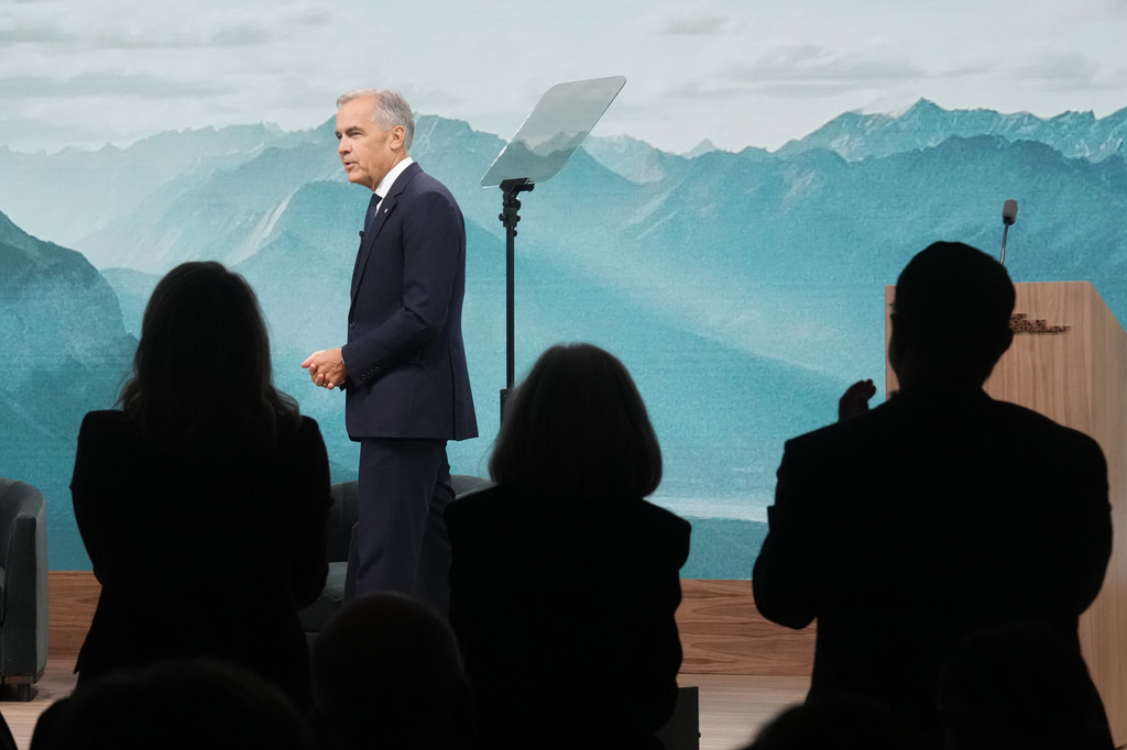 Prime Minister Mark Carney receives a standing ovation after delivering his opening remarks during the start of the second day at the 2026 Canada Investment Summit in Toronto, on Tuesday, Sept. 15, 2026. (Nathan Denette/The Canadian Press via AP)