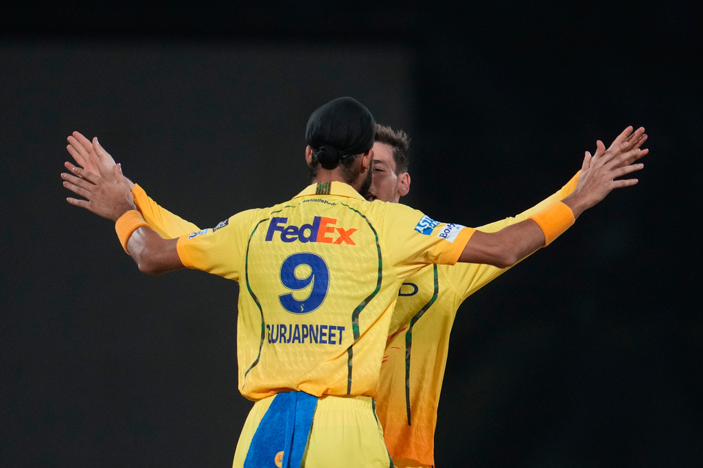 Chennai Super Kings' Noor Ahmad and Gurjapneet Singh celebrate the wicket of Delhi Capitals' Karun Nair during the Indian Premier League cricket match between Chennai Super Kings and Delhi Capitals in New Delhi, India, Tuesday, May 5, 2026. (AP Photo/Manish Swarup)