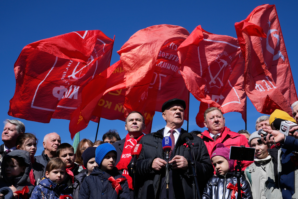 FILE - Russian Communist Party leader Gennady Zyuganov, center, speaks to journalists after laying flowers at the mausoleum of USSR founder Vladimir Lenin in Red Square, in Moscow, marking the 156th anniversary of his birth on Wednesday, April 22, 2026. (AP Photo/Pavel Bednyakov, File)