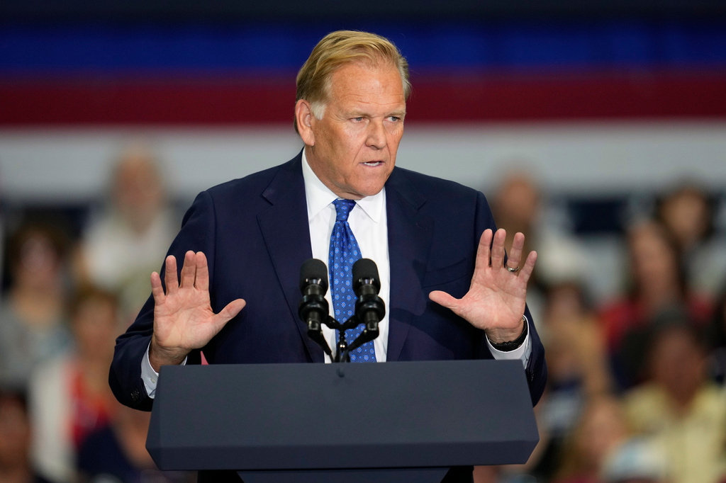 Republican Senate candidate Mike Rogers speaks at Universal Contracting and Urban Tree Trimming, Monday, Aug. 31, 2026, in Sterling Heights, Mich. (AP Photo/Paul Sancya)