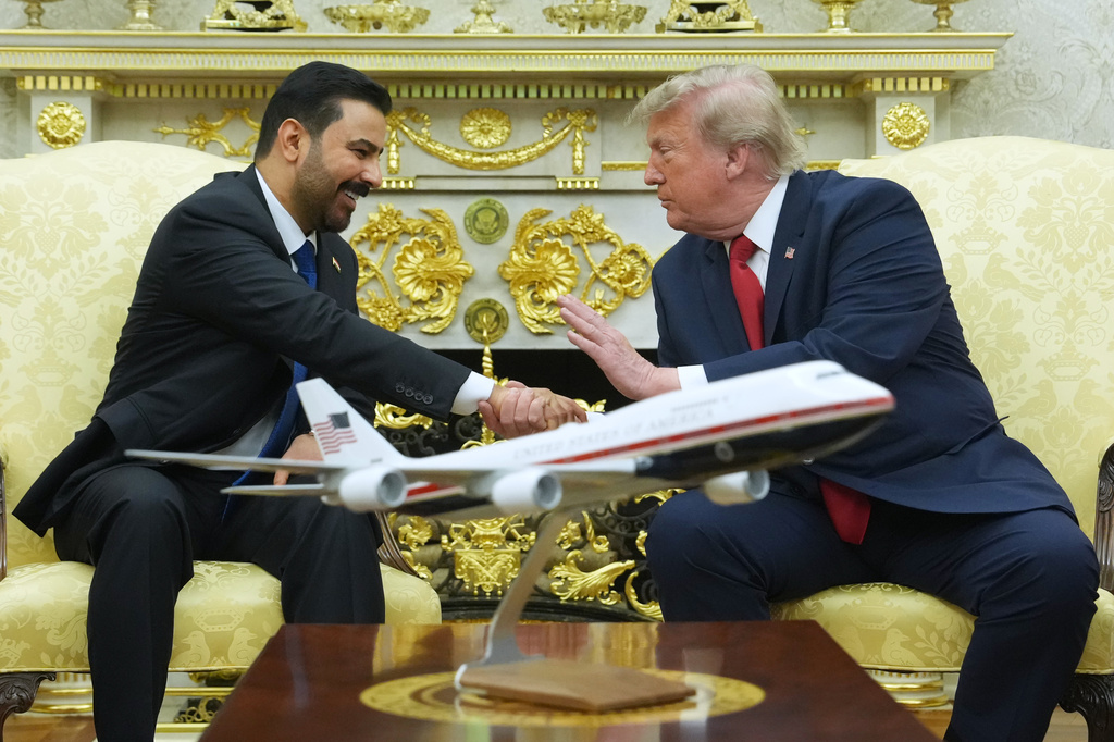 President Donald Trump meets with Iraq's Prime Minister Ali al-Zaidi in the Oval Office of the White House, Tuesday, July 14, 2026, in Washington. (AP Photo/Julia Demaree Nikhinson)