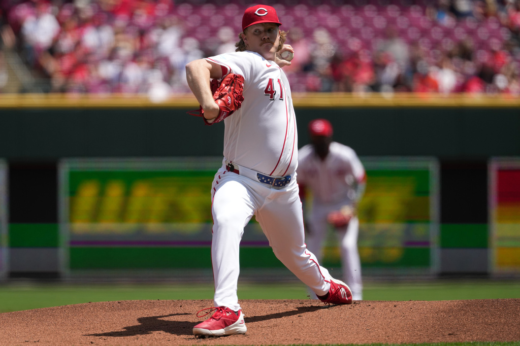 Cincinnati Reds pitcher Andrew Abbott delivers during the first inning of a baseball game against the Houston Astros, Sunday, May 10, 2026, in Cincinnati. (AP Photo/Kareem Elgazzar)