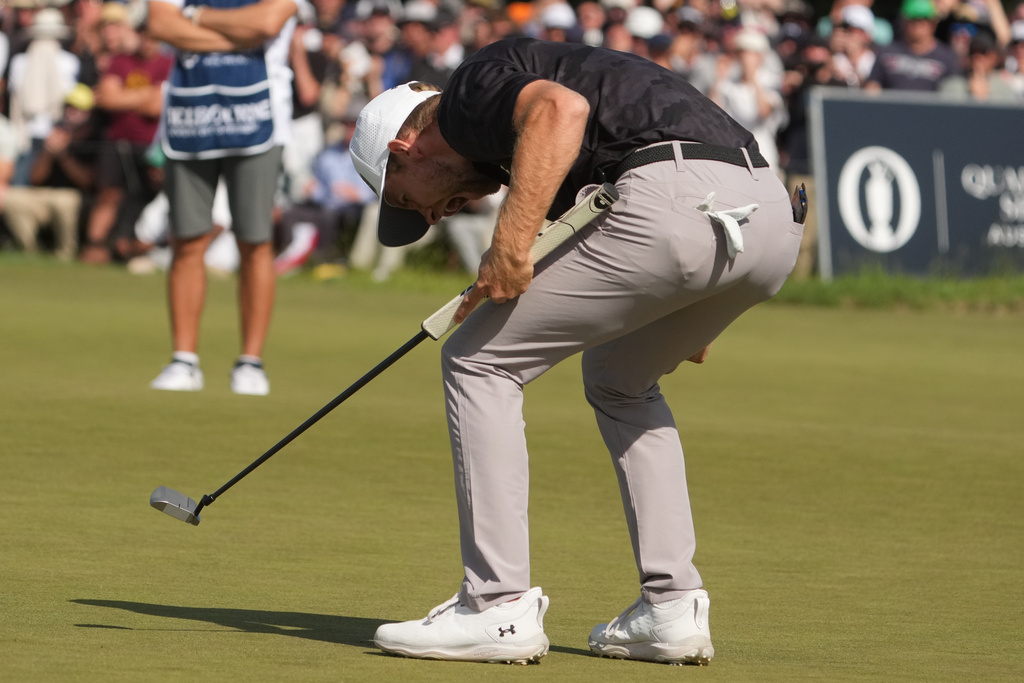 Denmark's Rasmus Neergaard-Petersen celebrates after sinking his putt on the 18th during the final round of the Australian Open golf tournament in Melbourne, Australia, Sunday, Dec. 7, 2025. (AP Photo/Asanka Brendon Ratnayake)