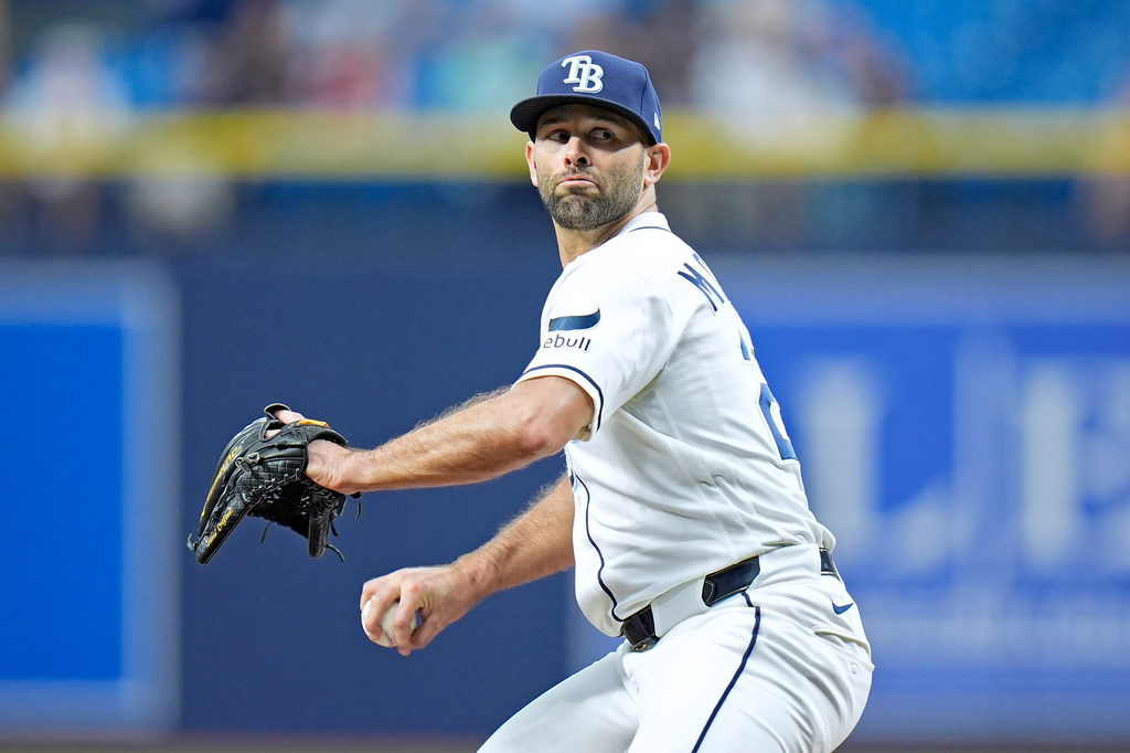 Tampa Bay Rays pitcher Nick Martinez goes into his delivery against the Boston Red Sox during the first inning of a baseball game Tuesday, June 9, 2026, in St. Petersburg, Fla. (AP Photo/Chris O'Meara)