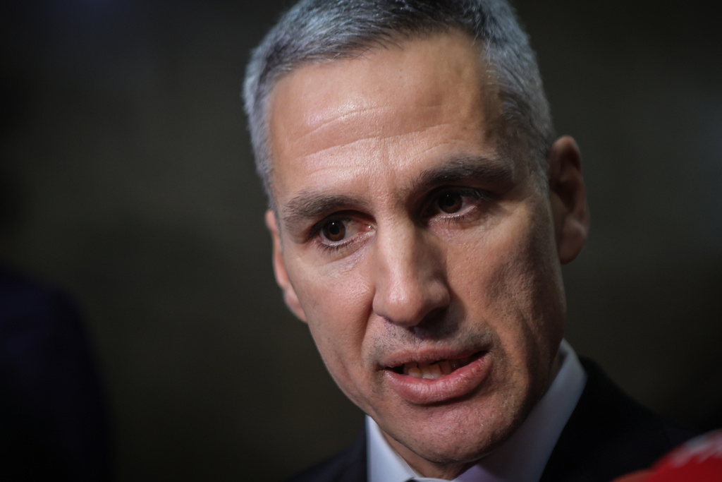 Andrey Gyurov, the prime minister–designate, speaks to journalists after presenting the list of his caretaker government, at Bulgarian presidency office in Sofia, Bulgaria, Wednesday, Feb. 18, 2026. (AP Photo/Valentina Petrova)