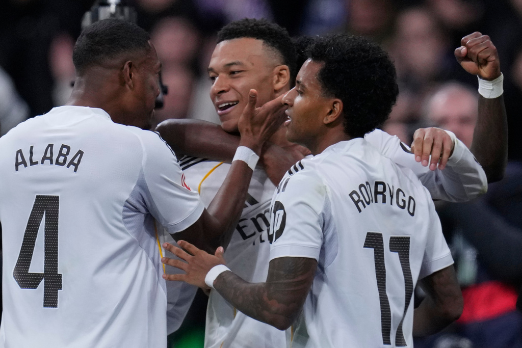 Real Madrid's Kylian Mbappe celebrates after scoring his side's second goal during the Spanish La Liga soccer match between Real Madrid and Rayo Vallecano in Madrid, Spain, Sunday, Feb. 1, 2026. (AP Photo/Manu Fernandez)