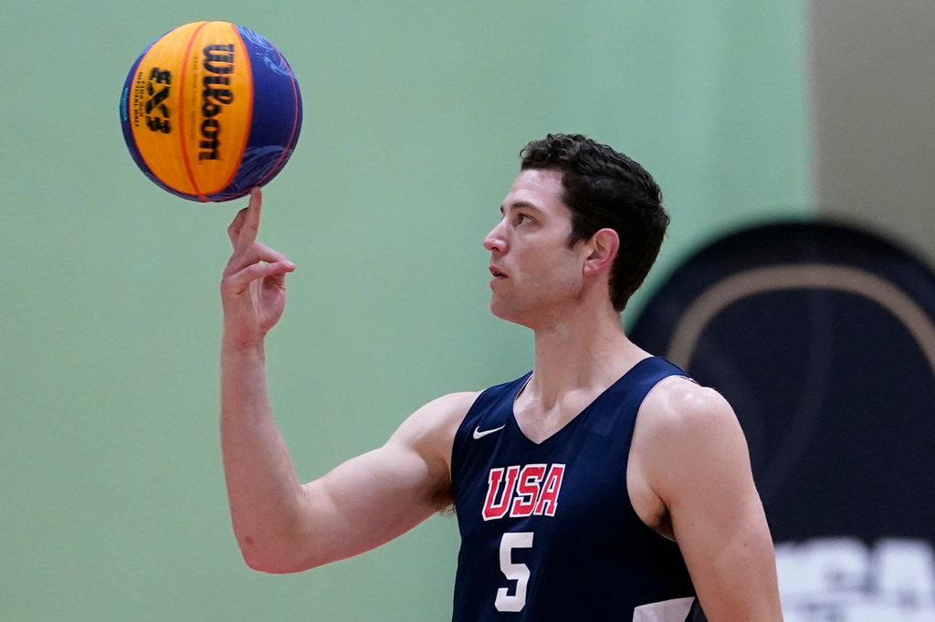 FILE - Jimmer Fredette spins a basketball during practice for the USA Basketball 3x3 national team, Oct. 31, 2022, in Miami Lakes, Fla. (AP Photo/Lynne Sladky, File)