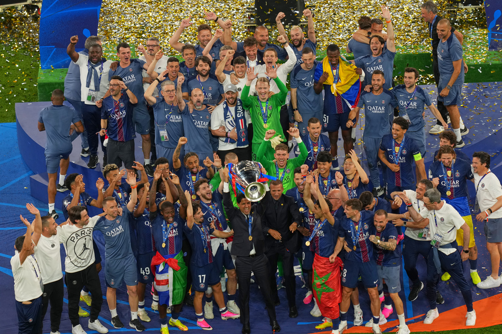 PSG owner Nasser bin Ghanim Al-Khelaifi lifts the trophy after defeating Arsenal at the Champions League final soccer match between Paris Saint-Germain and Arsenal in Budapest, Hungary, Saturday, May 30, 2026. (AP Photo/Vadim Ghirda)