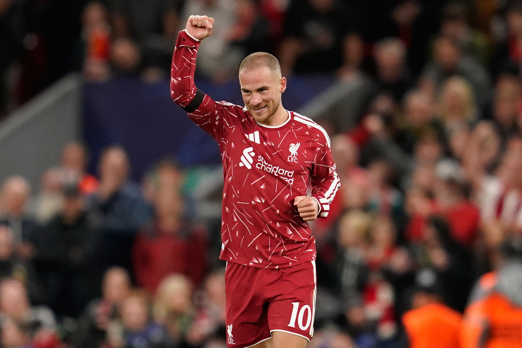 Liverpool's Alexis Mac Allister celebrates after scoring his side's second goal during the Champions League opening phase soccer match between Liverpool and Atletico Madrid in Liverpool, England, Wednesday, Sept. 9, 2026. (AP Photo/Dave Thompson)