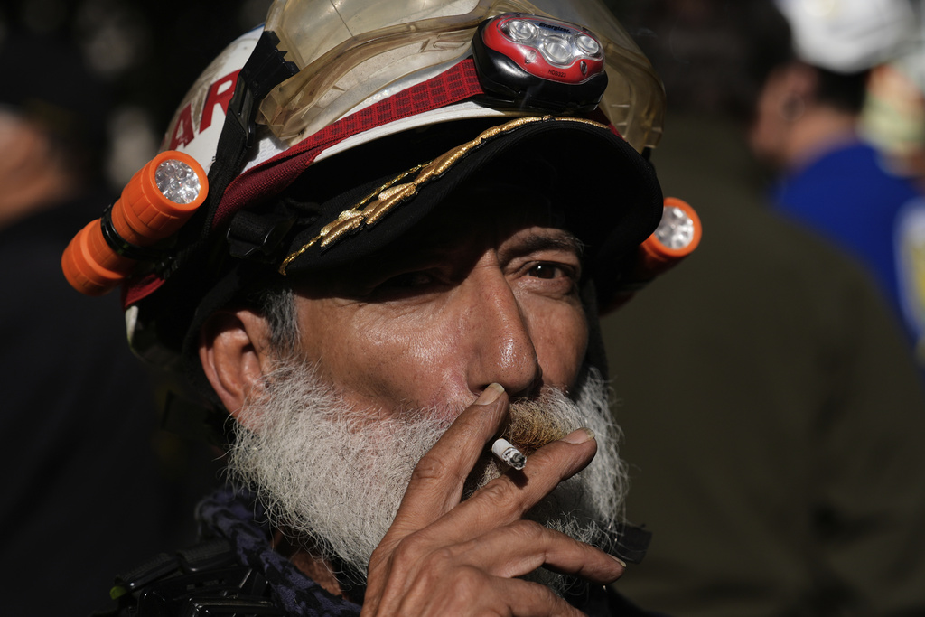 Carlos Cienfuegos, commander of the Topos volunteer rescue workers brigade, attends a ceremony marking the 1985 earthquake's 40th anniversary in Mexico City, Friday, Sept. 19, 2025. (AP Photo/Marco Ugarte)