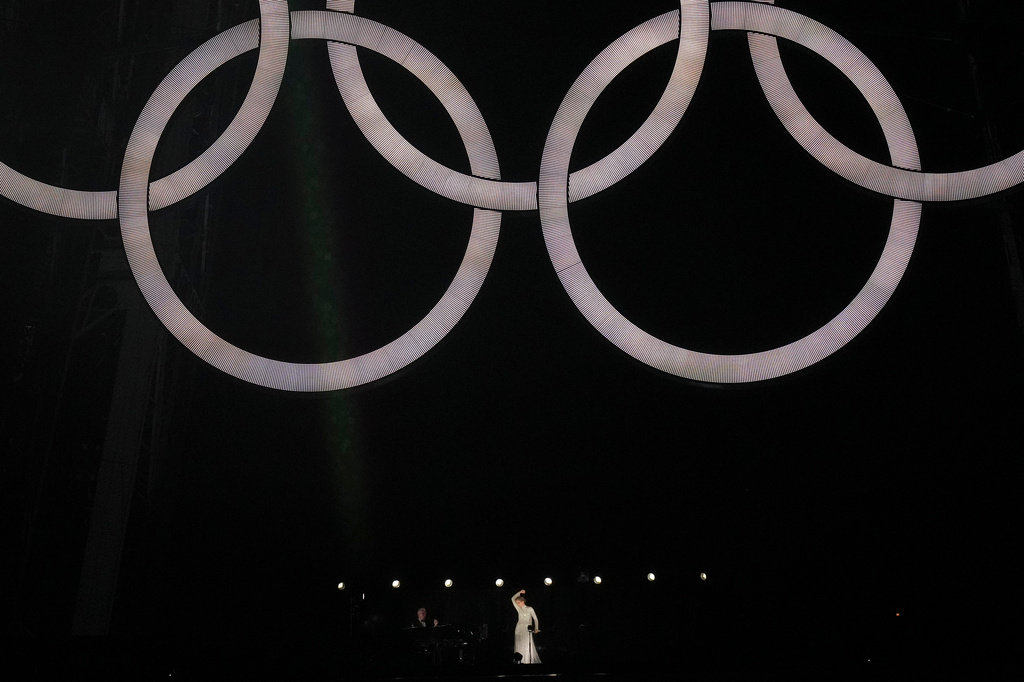 FILE - Celine Dion performs in Paris, France, during the opening ceremony of the 2024 Summer Olympics, July 26, 2024. (AP Photo/Thibault Camus, File)