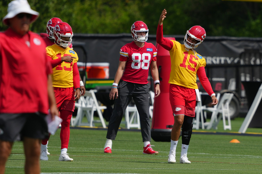 Kansas City Chiefs quarterback Patrick Mahomes (15) signals teammates during the NFL football team's practice Wednesday, June 10, 2026, in Kansas City, Mo. (AP Photo/Ed Zurga)