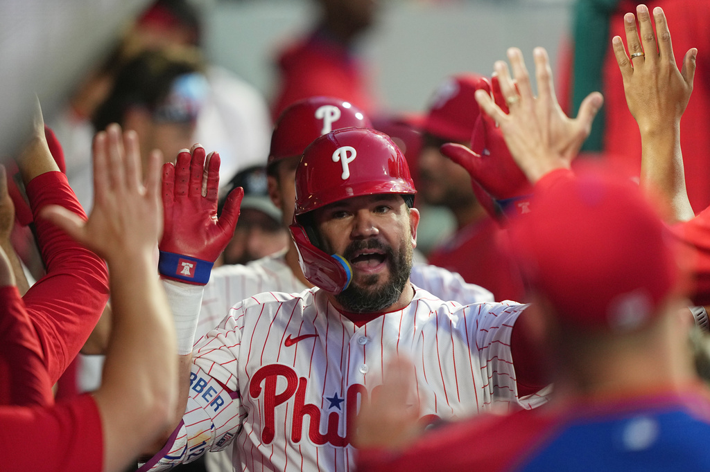 Philadelphia Phillies' Kyle Schwarber celebrates after his two-run home run off Chicago Cubs pitcher Javier Assad during the third inning of a baseball game, Monday, April 13, 2026, in Philadelphia. (AP Photo/Matt Rourke)