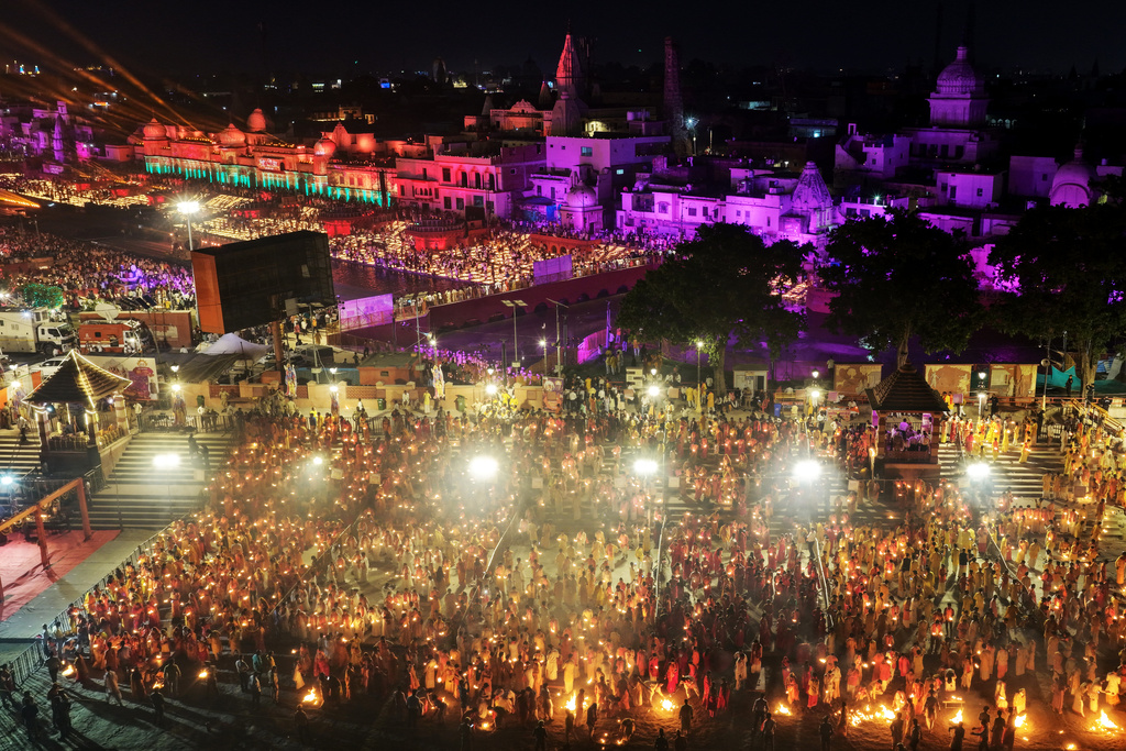 About 2.61 million oil lamps are lit along the Saryu river during Deepotsav celebrations on the eve of Diwali, creating a new Guinness World Record, in Ayodhya, India, Sunday, Oct. 19, 2025. (AP Photo/Rajesh Kumar Singh)