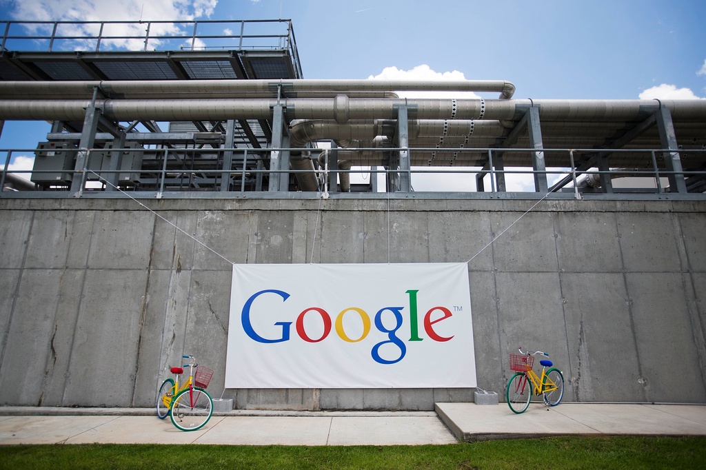 FILE -- A banner hangs during a ceremony announcing a proposed $300 million expansion of Google's data center operations Tuesday, June 2, 2015, in Lithia Springs, Ga. (AP Photo/David Goldman, file)