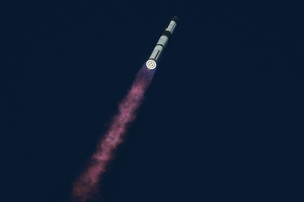 SpaceX's mega rocket Starship makes a test flight from Starbase, Texas, Monday, Oct. 13, 2025. (AP Photo/Eric Gay)