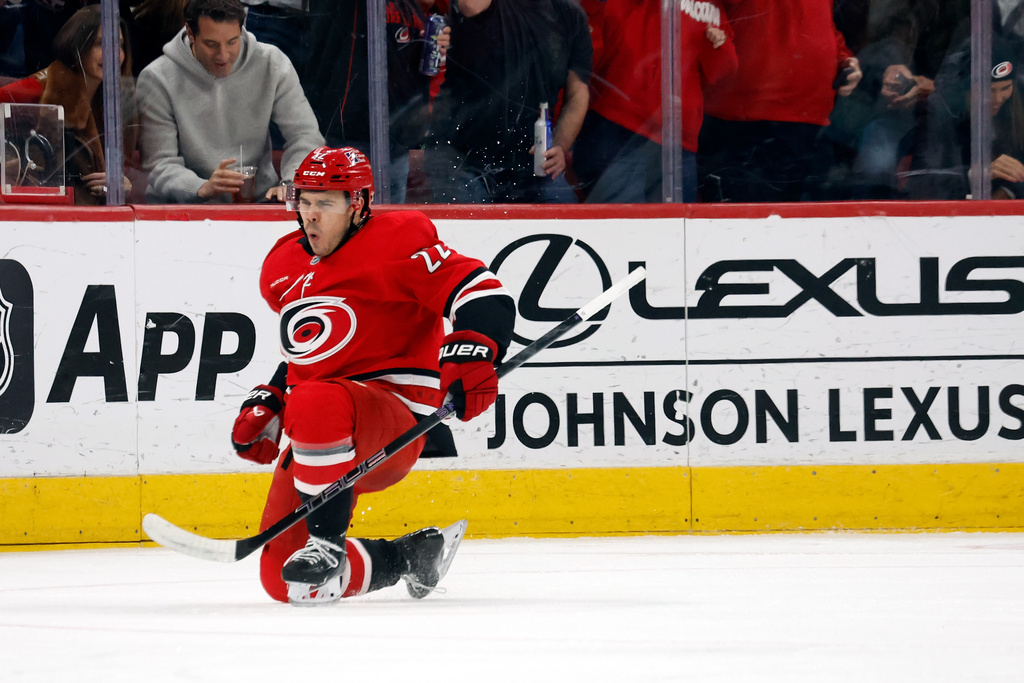Carolina Hurricanes' Logan Stankoven (22) celebrates his goal against the Seattle Kraken during the first period of an NHL hockey game in Raleigh, N.C., Saturday, Jan. 10, 2026. (AP Photo/Karl DeBlaker)