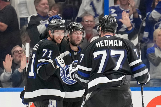 Tampa Bay Lightning center Anthony Cirelli (71) celebrates his goal against the Anaheim Ducks with defenseman Victor Hedman (77) and right wing Nikita Kucherov during the third period of an NHL hockey game Saturday, Oct. 25, 2025, in Tampa, Fla. (AP Photo/Chris O'Meara) Tampa Bay Lightning center Anthony Cirelli (71) celebrates his goal against the Anaheim Ducks with defenseman Victor Hedman (77) and right wing Nikita Kucherov during the third period of an NHL hockey game Saturday, Oct. 25, 2025, in Tampa, Fla. (AP Photo/Chris O'Meara)