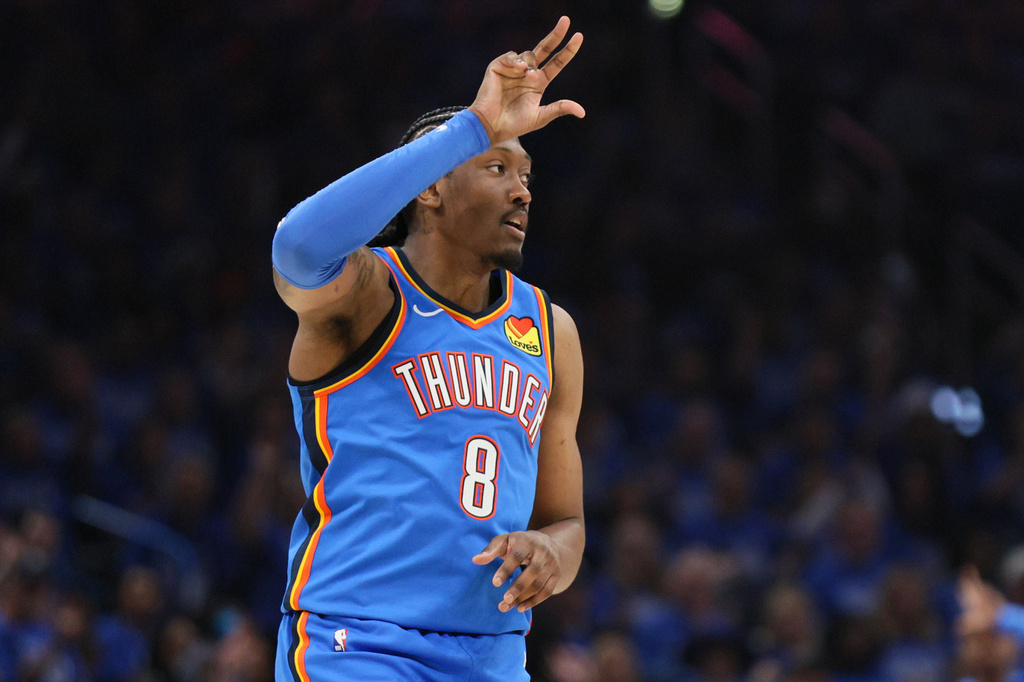 Oklahoma City Thunder guard Jalen Williams gestures after making a 3-point basket during the second half in Game 1 against the Phoenix Suns in a first-round NBA playoffs basketball series Sunday, April 19, 2026, in Oklahoma City. (AP Photo/Nate Billings)